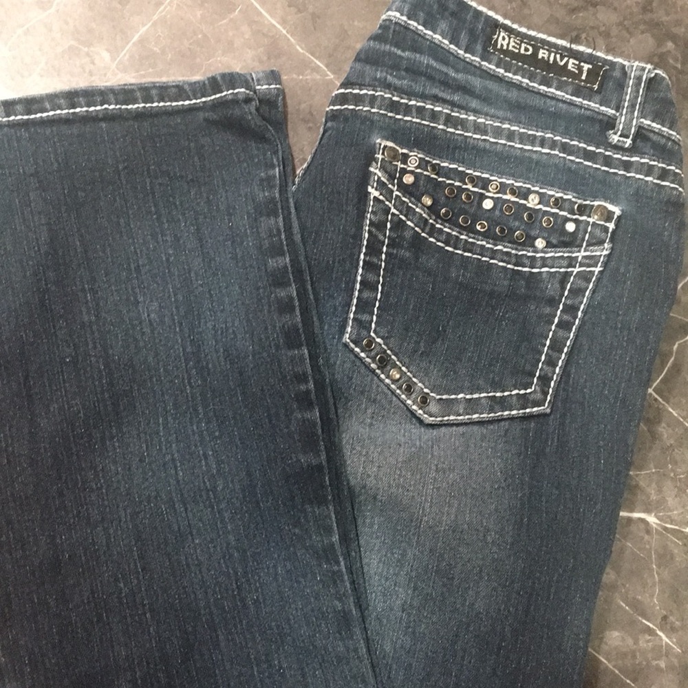 Red rivet jeans